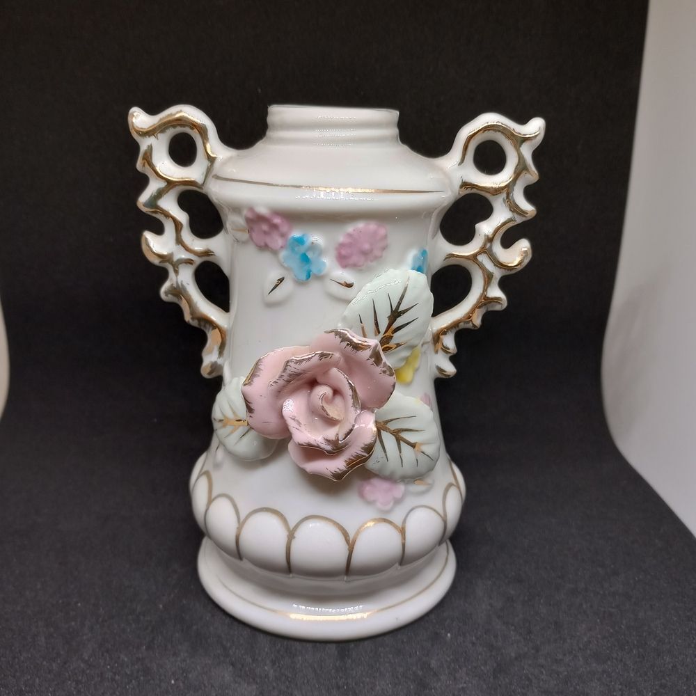 Elegant White Vase with Pink Floral Accents